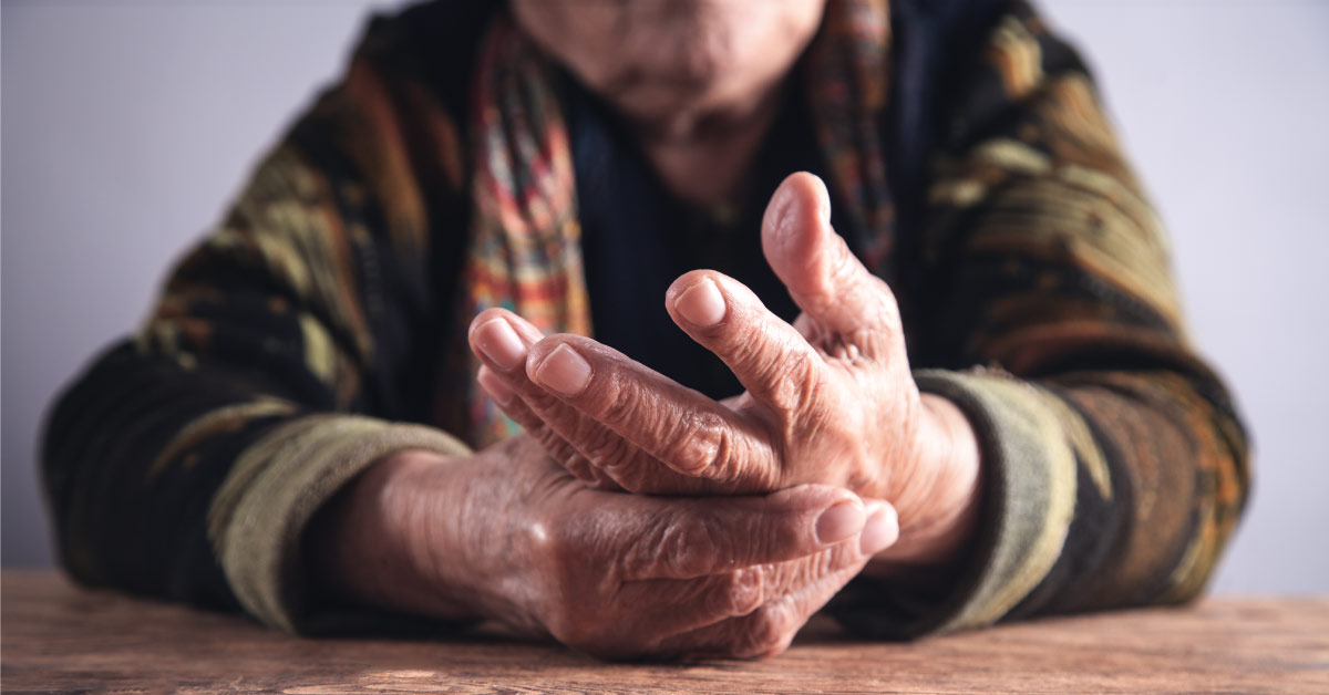 image of senior person's hands suffering from arthritis 